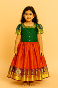 Ethnic Pattu Pavadai Set – Green Blouse & Orange Zari Skirt